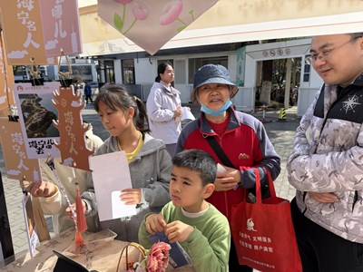 猜谜簪花趣满“集”，海宁摊位人文浓